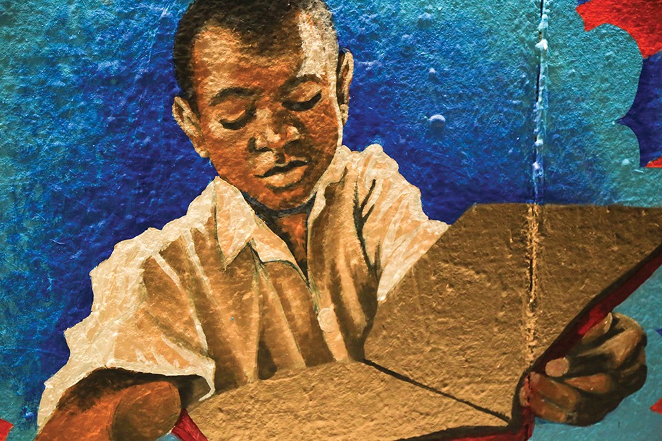 Ronald Burrow's portrait of a child reading a golden book. - NICHOLAS COULTER