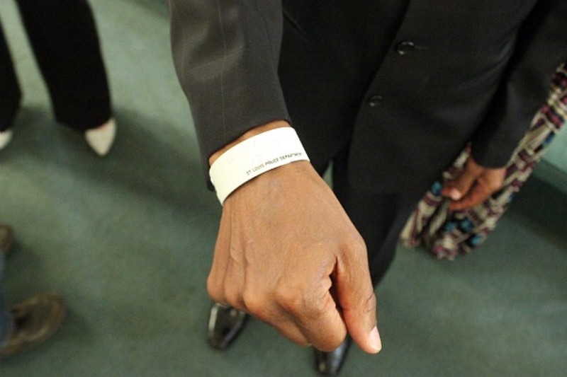 The Rev. Darryl Gray wore the ID bracelet from his arrest for days after the incident. - DOYLE MURPHY