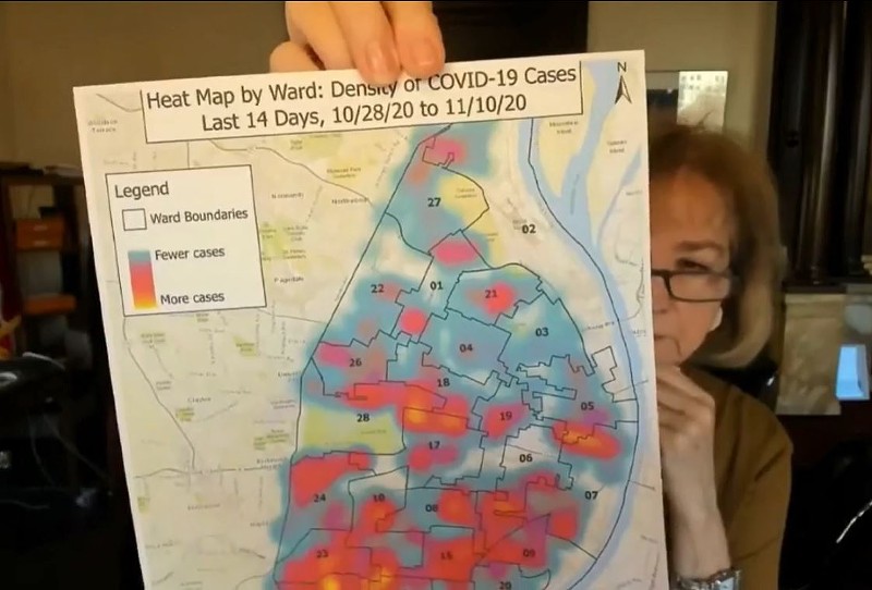 St. Louis Mayor Lyda Krewson holds up a new COVID-19 "heat map" of St. Louis City. - SCREENSHOT VIA KMOV/FACEBOOK