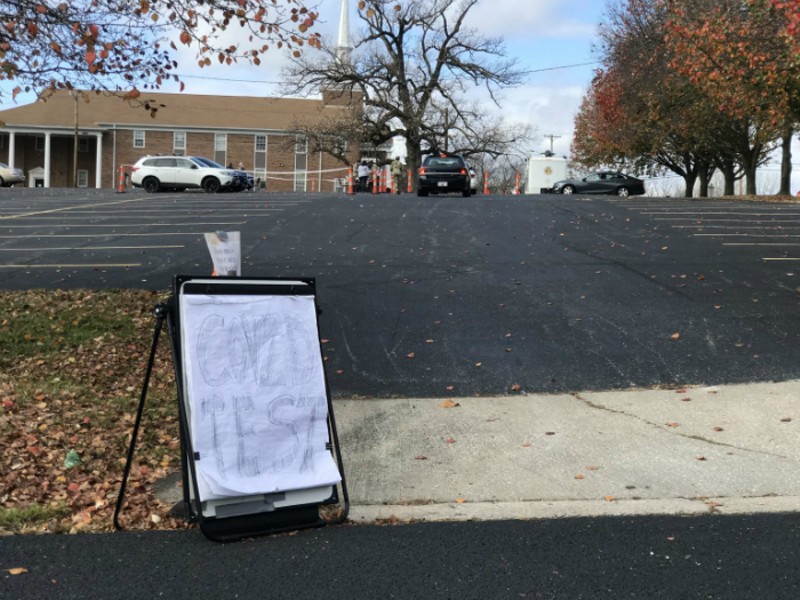 A sign marks the entrance to a drive-through COVID test site at Memorial Baptist Church in Columbia, Missouri on Monday, Nov. 9. - TESSA WEINBERG/MISSOURI INDEPENDENT