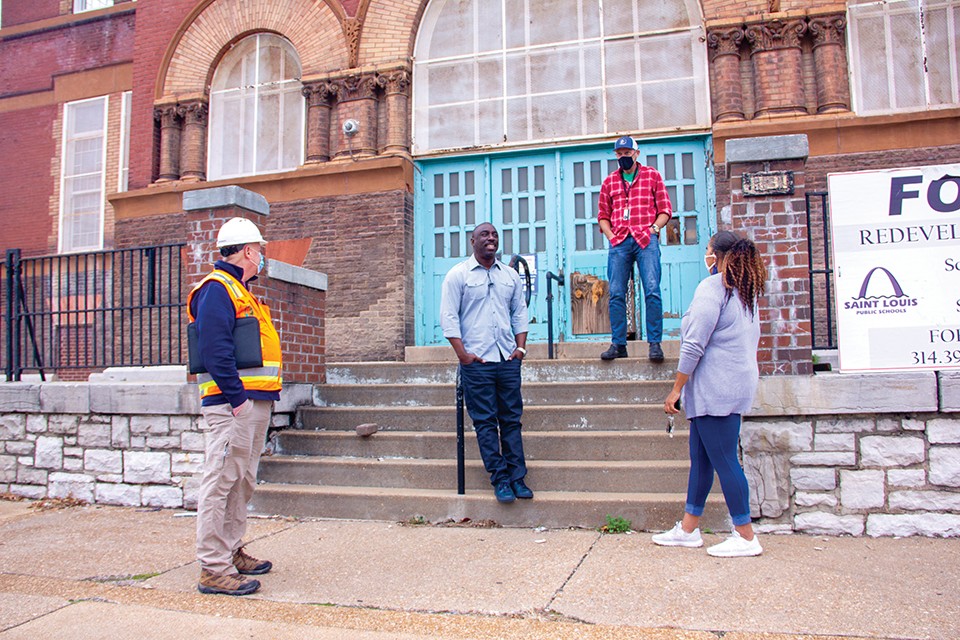 Kevin Bryant (center) of Kingsway Development aims to rehab the 127-year-old former Euclid School into senior apartments. - DANNY WICENTOWSKI