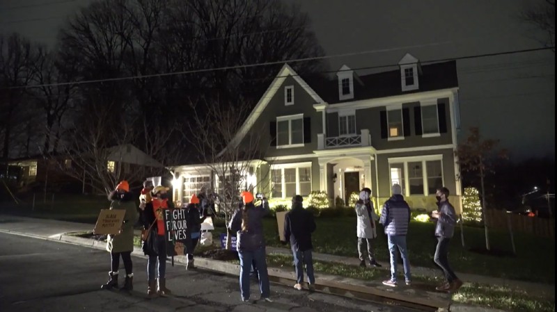 The protesters in front of Hawley's home in Virginia. - SCREENSHOT