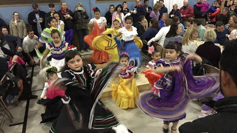 In past years, folk dancers entertained people waiting in endless lines to pack into St. Cecilia's fish fry. - KELLY GLUECK