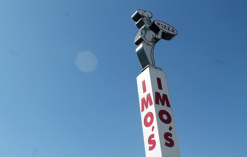 The Imo's Pizza sign on Hampton Avenue proudly overlooks Highway 40. - Riley Mack