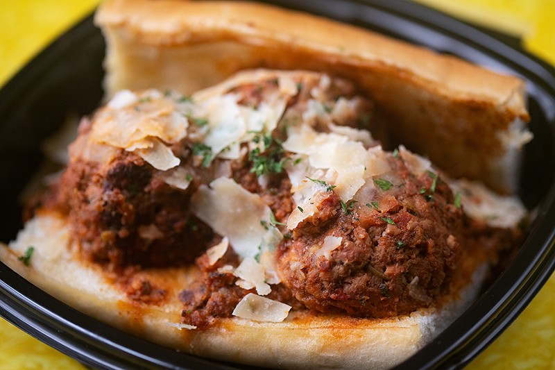 Smoked meatball sub with bolognese and shaved cheese. - MABEL SUEN