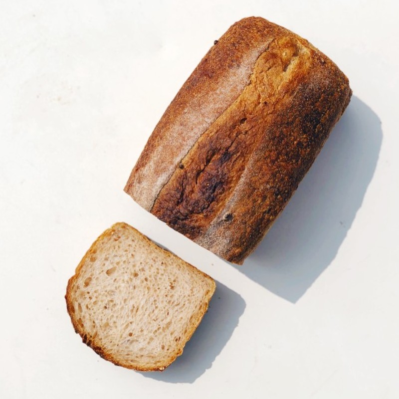 This lovely bread could come out of your home oven thanks to Knead's sourdough starter giveaway. - COURTESY OF KNEAD BAKEHOUSE
