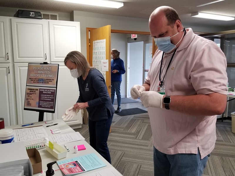 Nurse Anita Perry, left, and Curtis Lanning, emergency coordinator, process samples Friday during a drive-up COVID-19 testing event at the Livingston County Health Center in Chillicothe. - RUDI KELLER/MISSOURI INDEPENDENT