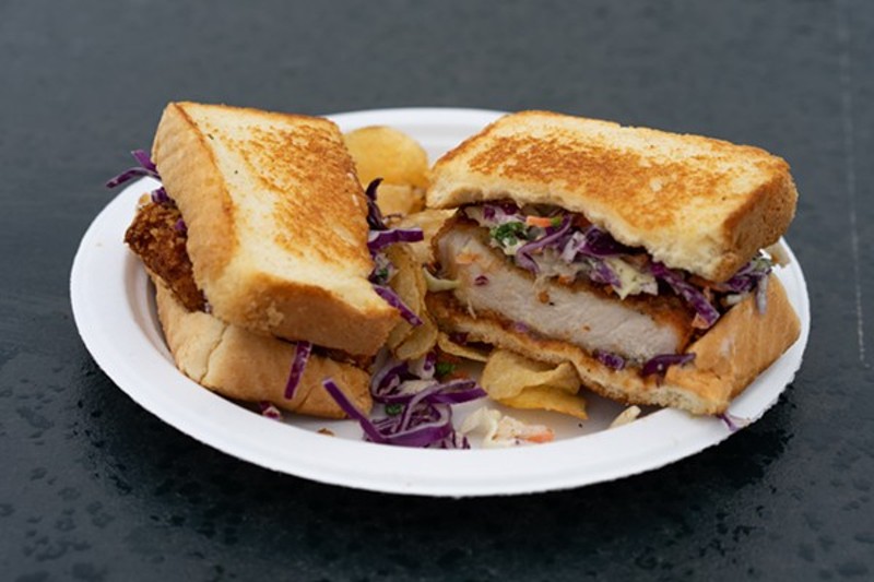 Sandos are served on toasted white bread with slaw and potato chips, which come in handy for scooping up runaway slaw. - HOLDEN HINDES