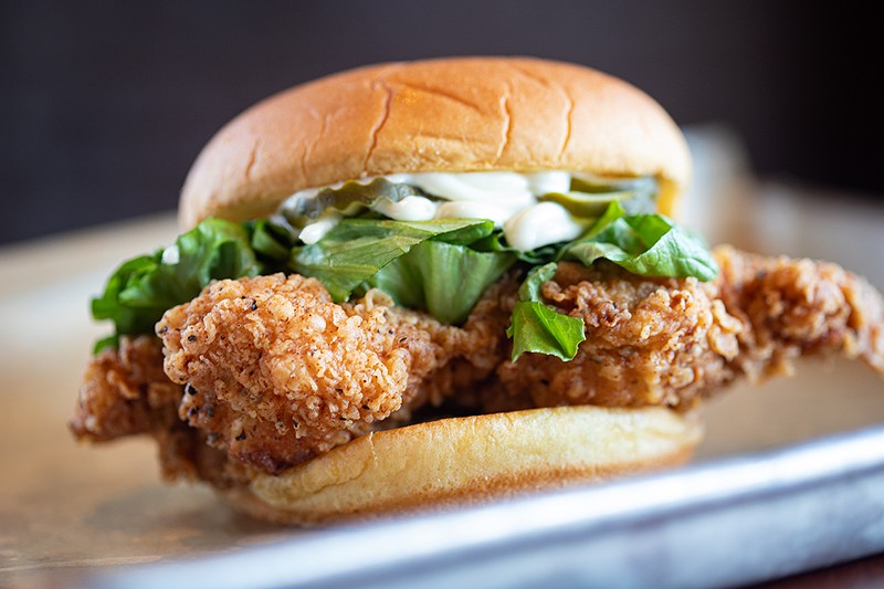 Hand-battered fried chicken sandwich with lettuce, pickles and mayo — available plain or spicy. - MABEL SUEN