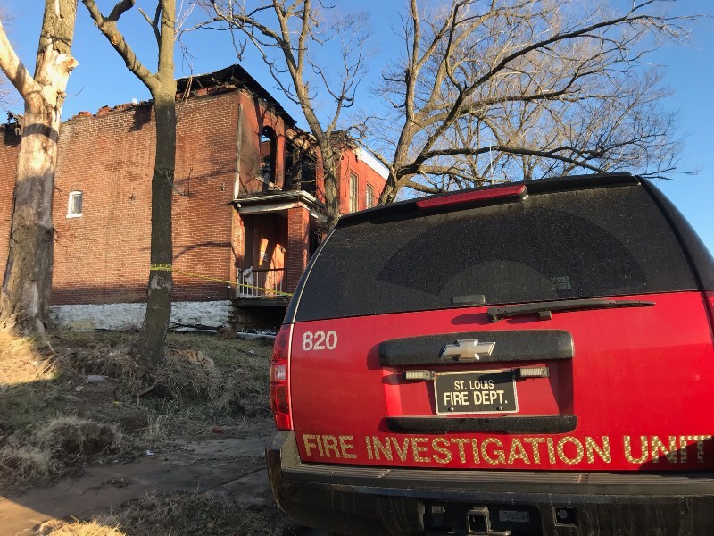 The Fire Investigation Unit on the scene after a St. Louis City firefighter was killed battling a fire on the 5900 block of Cote Brilliante. - RYAN KRULL