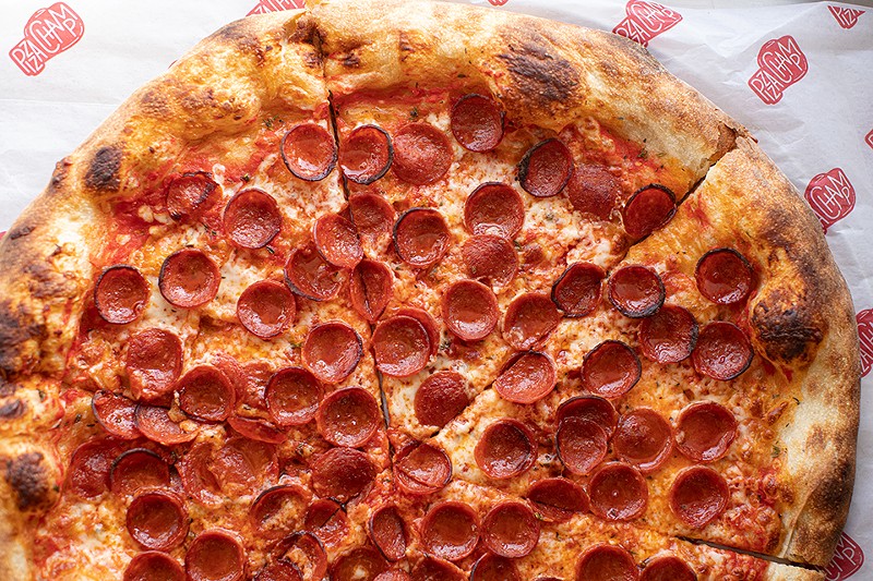 The "Triple Pepperoni" is Pizza Champ's signature pie. - MABEL SUEN