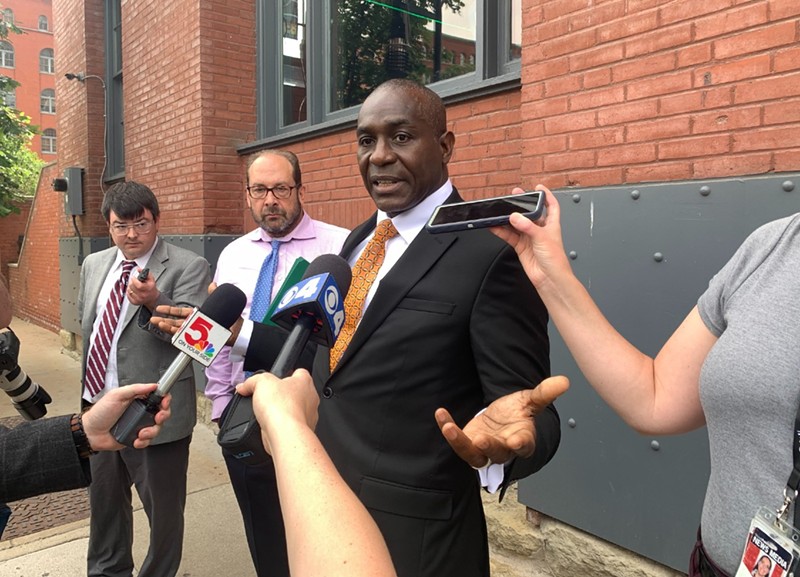 Board of Aldermen Chairman Lewis Reed speaks to reporters after federal court hearing on Thursday - MONICA OBRADOVIC