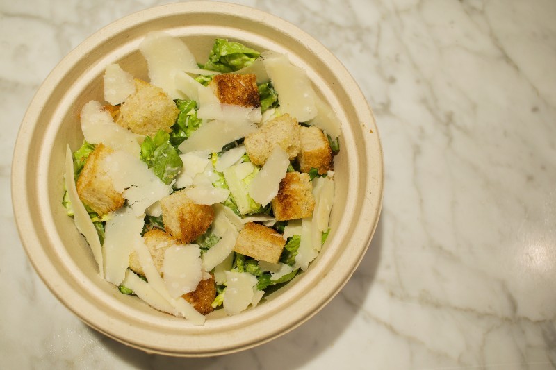 The Little Gem Caesar features garlic croutons, creamy anchovy dressing and shaved parmesan cheese. - CHERYL BAEHR
