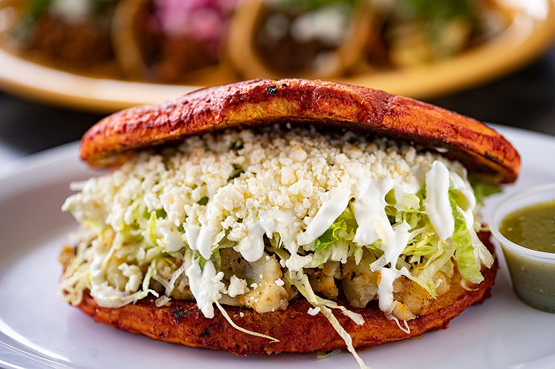 The Pambazo torta is stuffed with potato, lettuce, tomatoes and queso fresco and served on marinated bread. - Mabel Suen