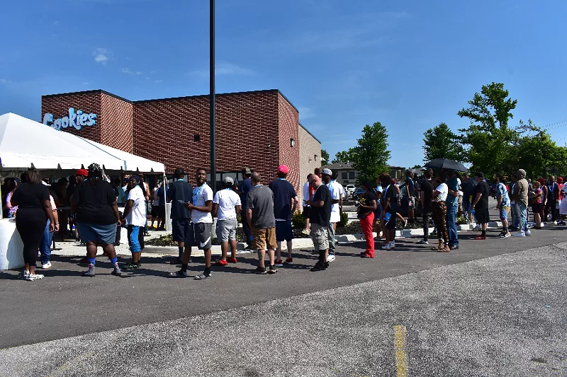 The line of excited Cookies customers stretched around the building on Saturday. - TOMMY CHIMS