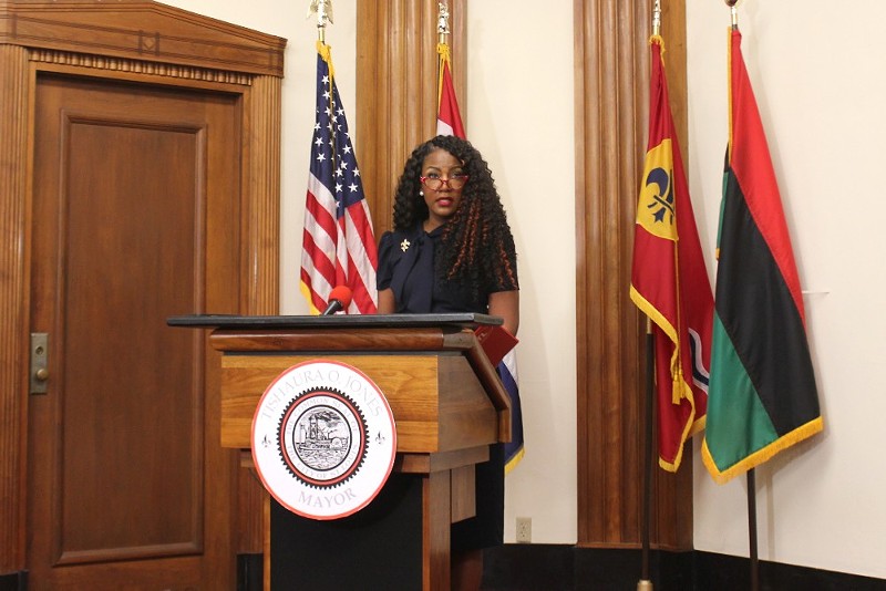 St. Louis Mayor Tishaura Jones stands on a podium.