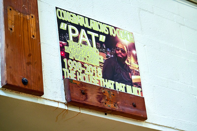 A sign honoring volunteer coach Lamont "Pat" Johnson, who helped Nettles rebuild Wohl. - THEO WELLING