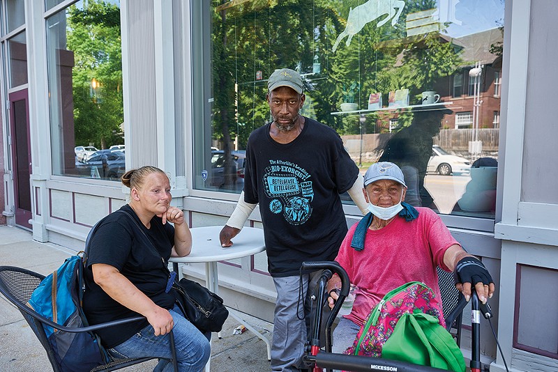 From left: Kayla, Keith and Sherry have been working at the intersection of Forest Park Parkway and Skinker Boulevard for years. - THEO WELLING