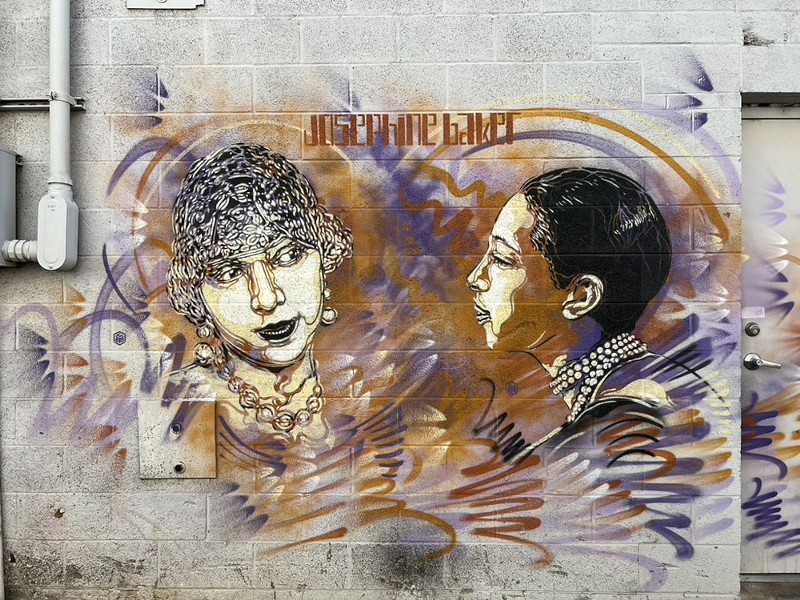 A mural of two women.