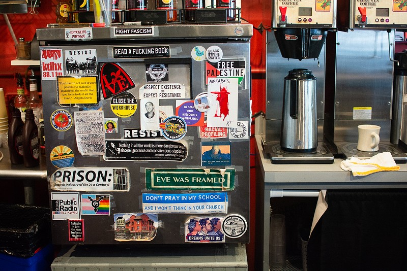 The small, sticker-covered refrigerator at MoKaBe's is iconic. - Andy Paulissen