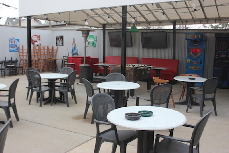 The patio features some classic arcade games, plus a foosball table. - PHOTO BY SARAH FENSKE
