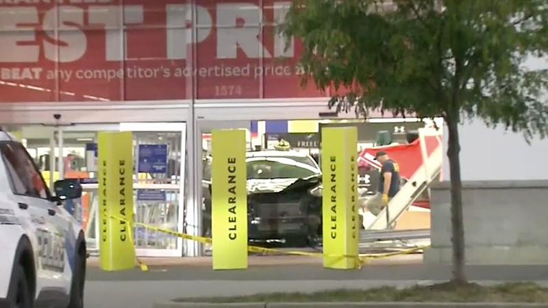 A Kia Optima smashed through the front door of an Academy Sports and Outdoors this morning in in O'Fallon, Illinois.