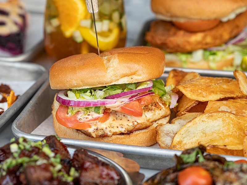 The Crispy Chick’n Sandwich features seasoned and house-battered vegan chicken, mayo, pickles, lettuce, tomato and onion.