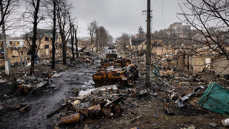 A street in Ukraine, where houses, vehicles and other structures have been destroyed to the ground.