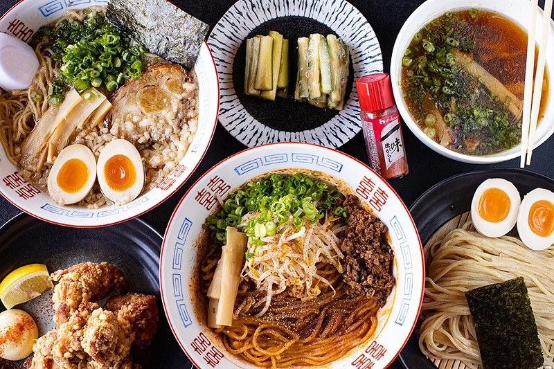A selection of items from Menya Rui, including (clockwise from top left) pork shoyu ramen, house cucumbers, original tsukemen, tantanmen brothless and karage. - Mabel Suen