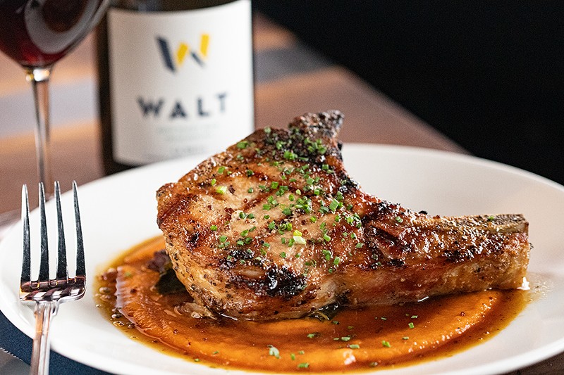 The Wenneman's pork rib chop, with sweet potato puree, greens and maple bourbon glaze, is a standout dish. - Mabel Suen