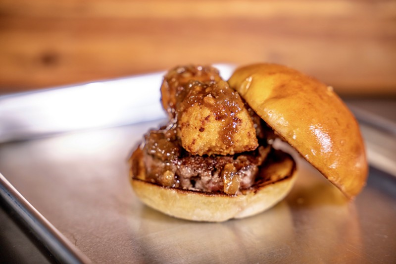 The Armory Burger features smoked bacon, white cheddar and mozzarella mac and cheese bites and bacon bourbon jam. - Courtesy of the Armory St. Louis