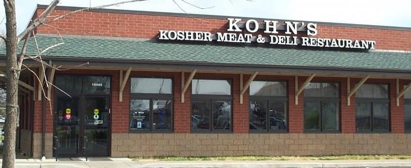 An exterior shot of Kohn's Kosher Meat & Deli Restaurant.