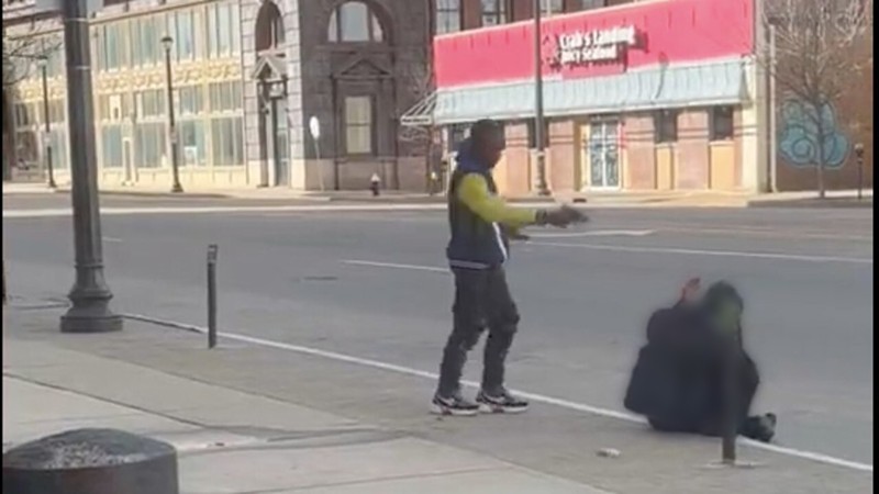 A still from the video posted to Twitter of a killing happening downtown on Tucker Blvd.