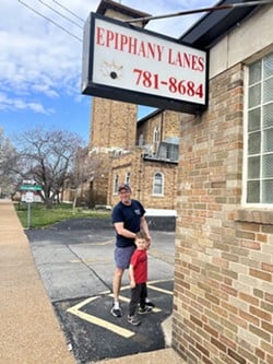 Kevin McKernan with his son checking out Epiphany Lanes.