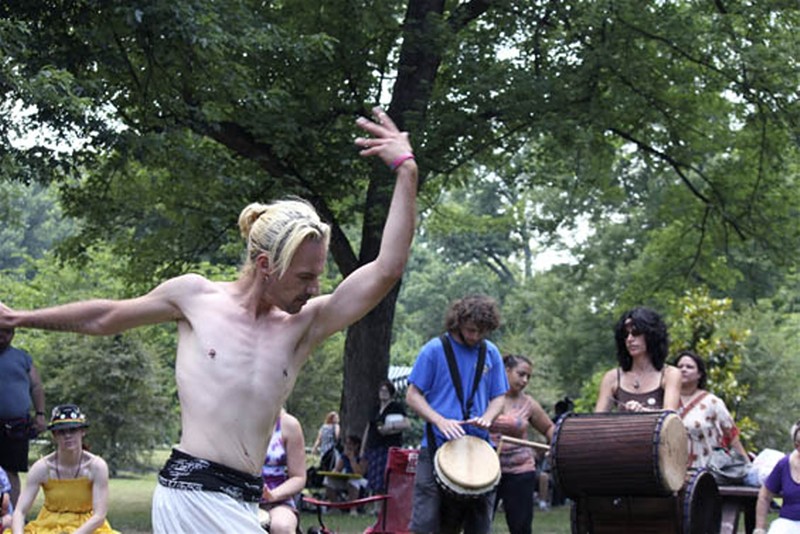 A man dances in the middle of a drum circle, Pagan Picnic, 2012 - Alexis Hitt