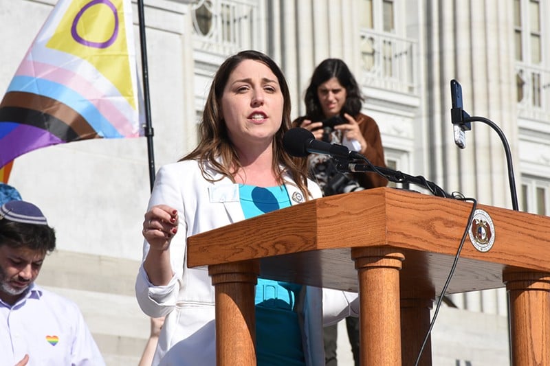 Representative Crystal Quade speaks at a rally for transgender rights on March 29, 2023.