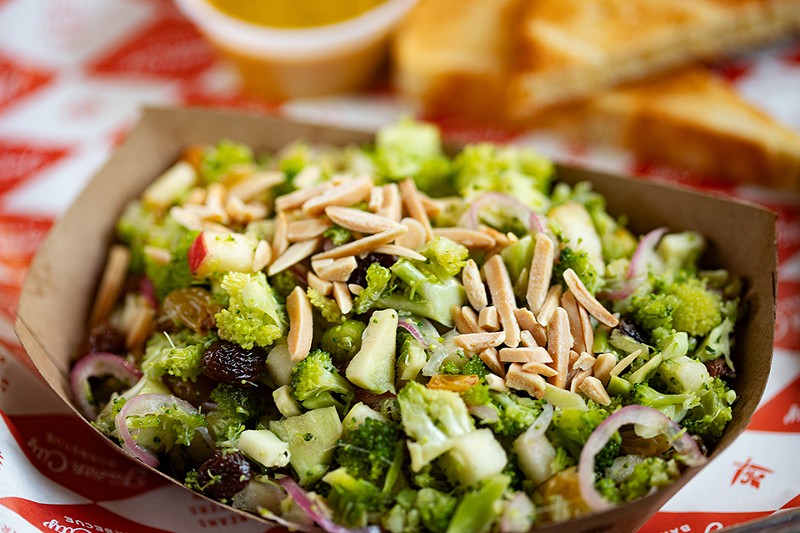 Sides include a broccoli salad.