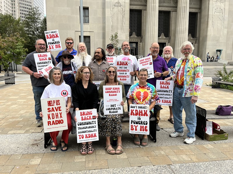 Supporters gathered outside the courthouse to support Andrea "Drea" Stein (center, bottom row) in her motion against KDHX and Kelly Wells.