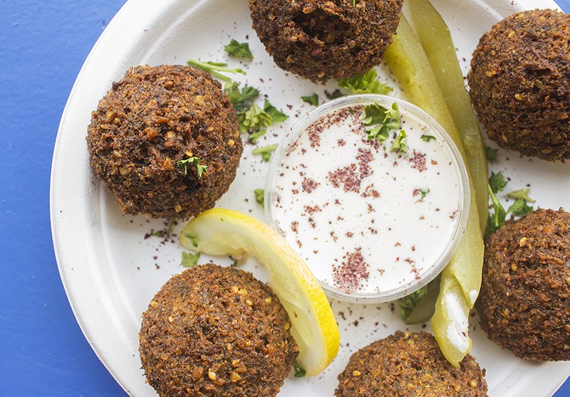 The falafel consists of deep-fried chickpeas, onion, parsley and spices. - MABEL SUEN