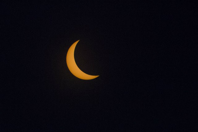 No, that's not the moon. That's the sun during a solar eclipse as viewed from South City.