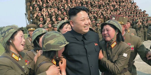 Kim Jong Un (center) may have benefited from the IT contractors your company hired, the FBI says. - VIA FLICKR李 季霖