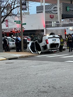 The police vehicle flipped not far from the intersection of 20th and Olive streets. - AARON BUNSE