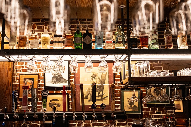 The bar at Dressel's has a snazzy new look, but its surroundings evoke the old Dressel's (brick walls, portraits of literary legends). - MABEL SUEN