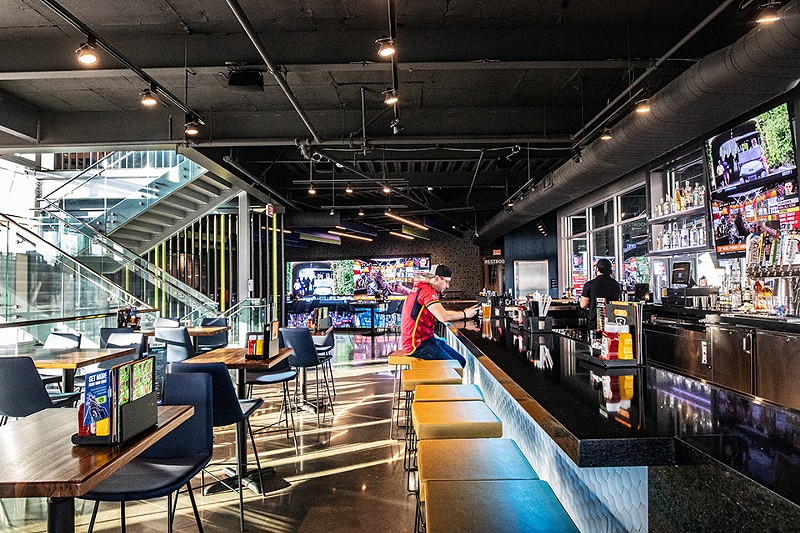 The bar at Topgolf offers a unique spot for a drink — and the liquor options fill seven pages. - MABEL SUEN