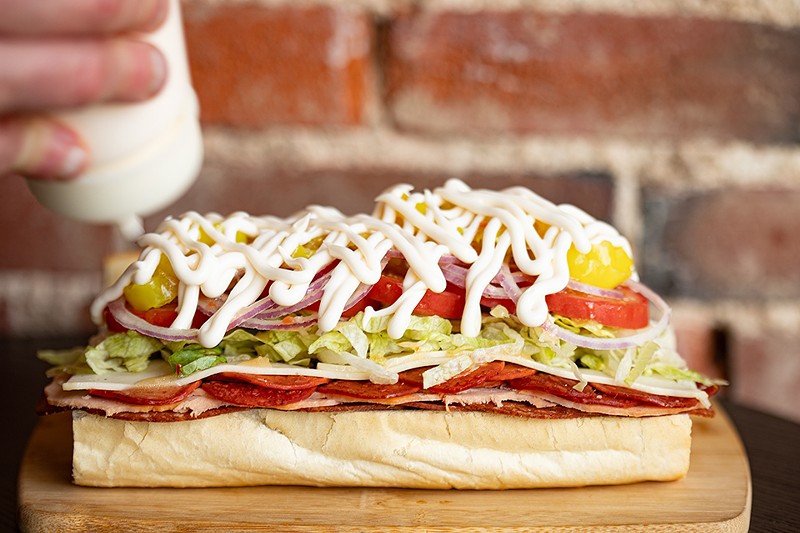 Vegan Deli & Butcher's Italian cold cut sandwich features chef Chris Bertke's riff on ham, turkey, pepperoni and provolone on a hoagie. - MABEL SUEN