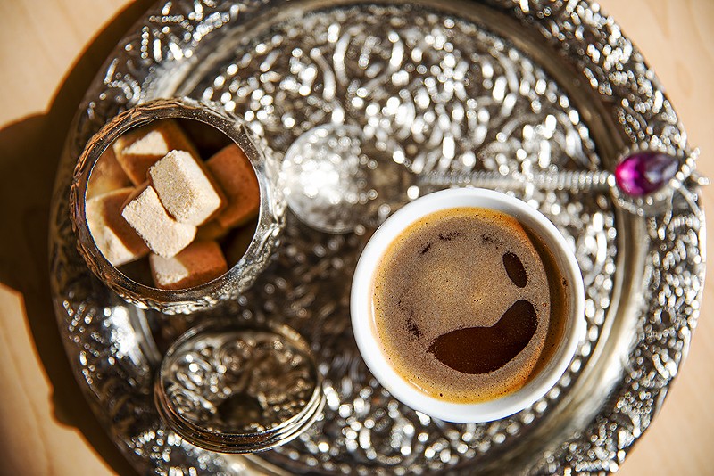 Bosnian coffee sits on a serving tray inside of Zlante Kapi. - ZACHARY LINHARES