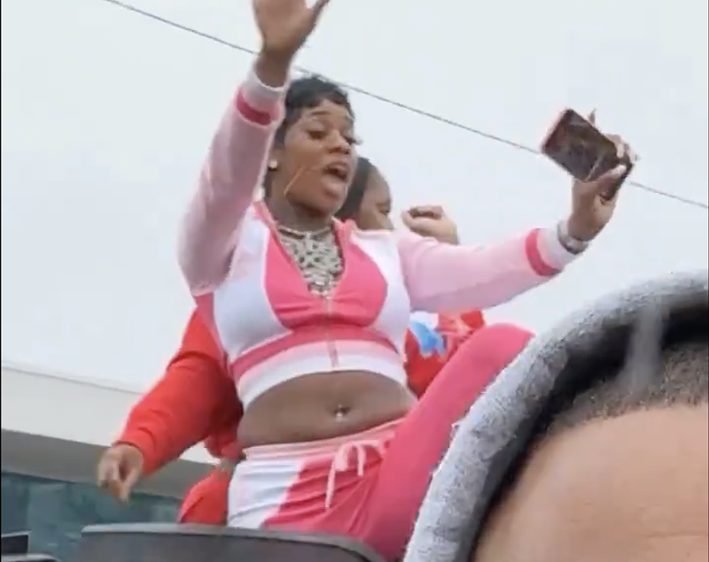 Sexyy Red posted a video of herself throwing an impromptu dance party just outside Harris-Stowe State University. She tweeted that she'd been barred from a rally at neighboring Chaifetz Arena. - SCREENSHOT