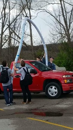 A truck drives through a Polar Pop archway in the parking lot of Hillsboro High School. - Photo provided by Nick Arl