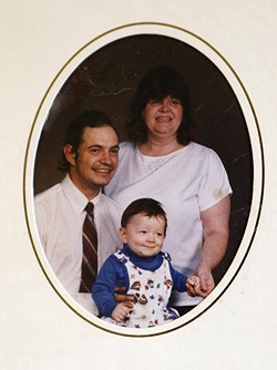 Kim Wells, right, with her young son and her husband before his murder. - COURTESY OF IAN BOYER