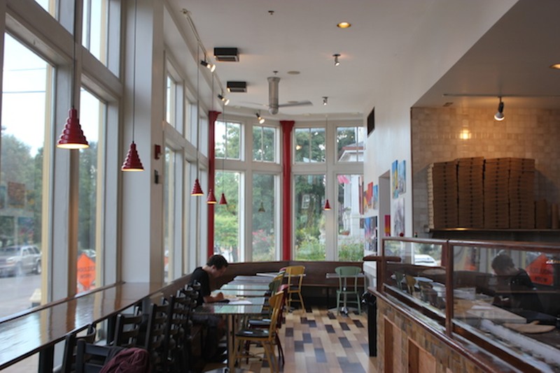 Cafe Piazza Now has wide windows overlooking Lemp Avenue and a view of the glassed-in kitchen. - PHOTO BY SARAH FENSKE